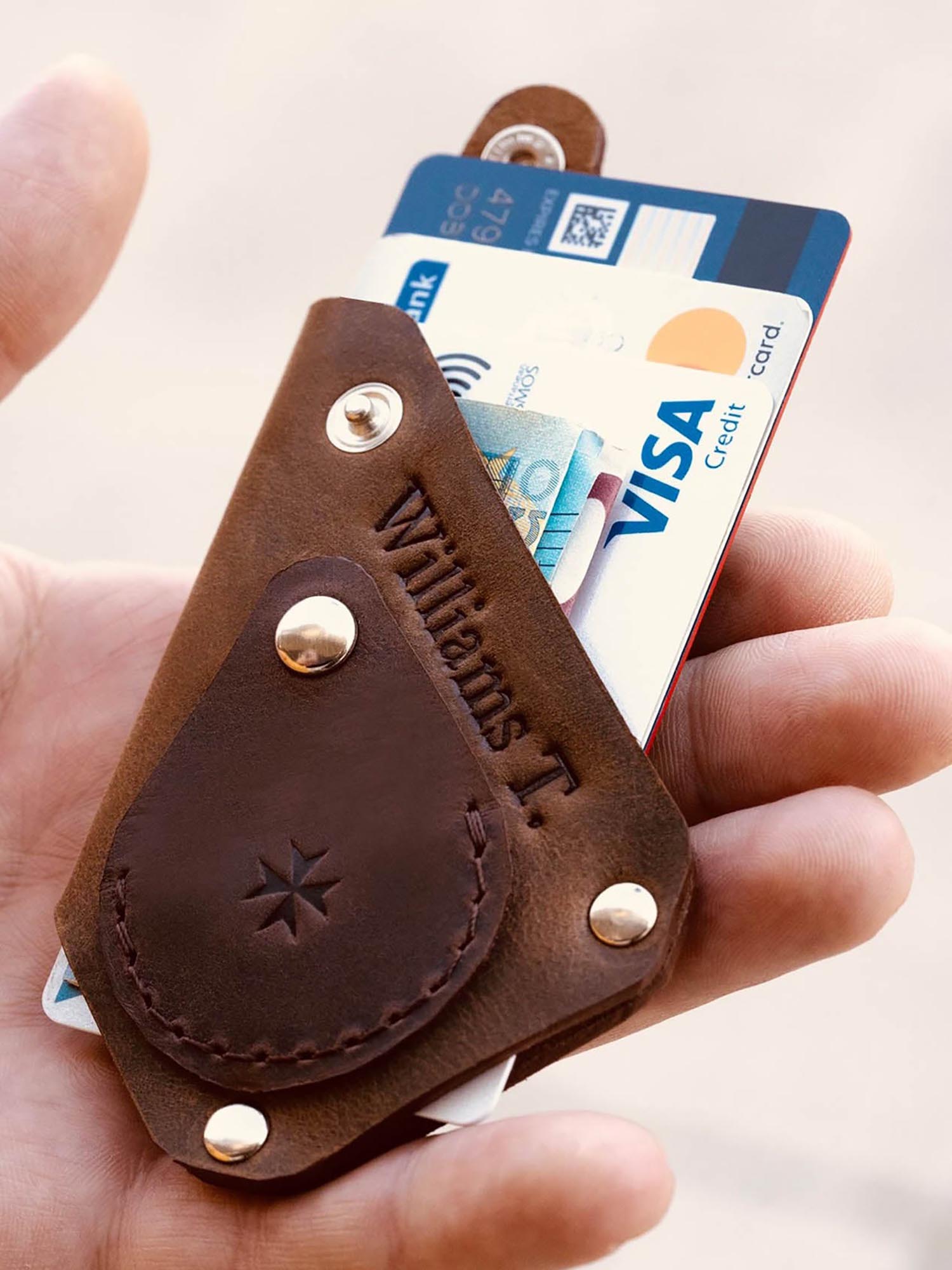 Portafoglio per carte, banconote e monete “Trigono”