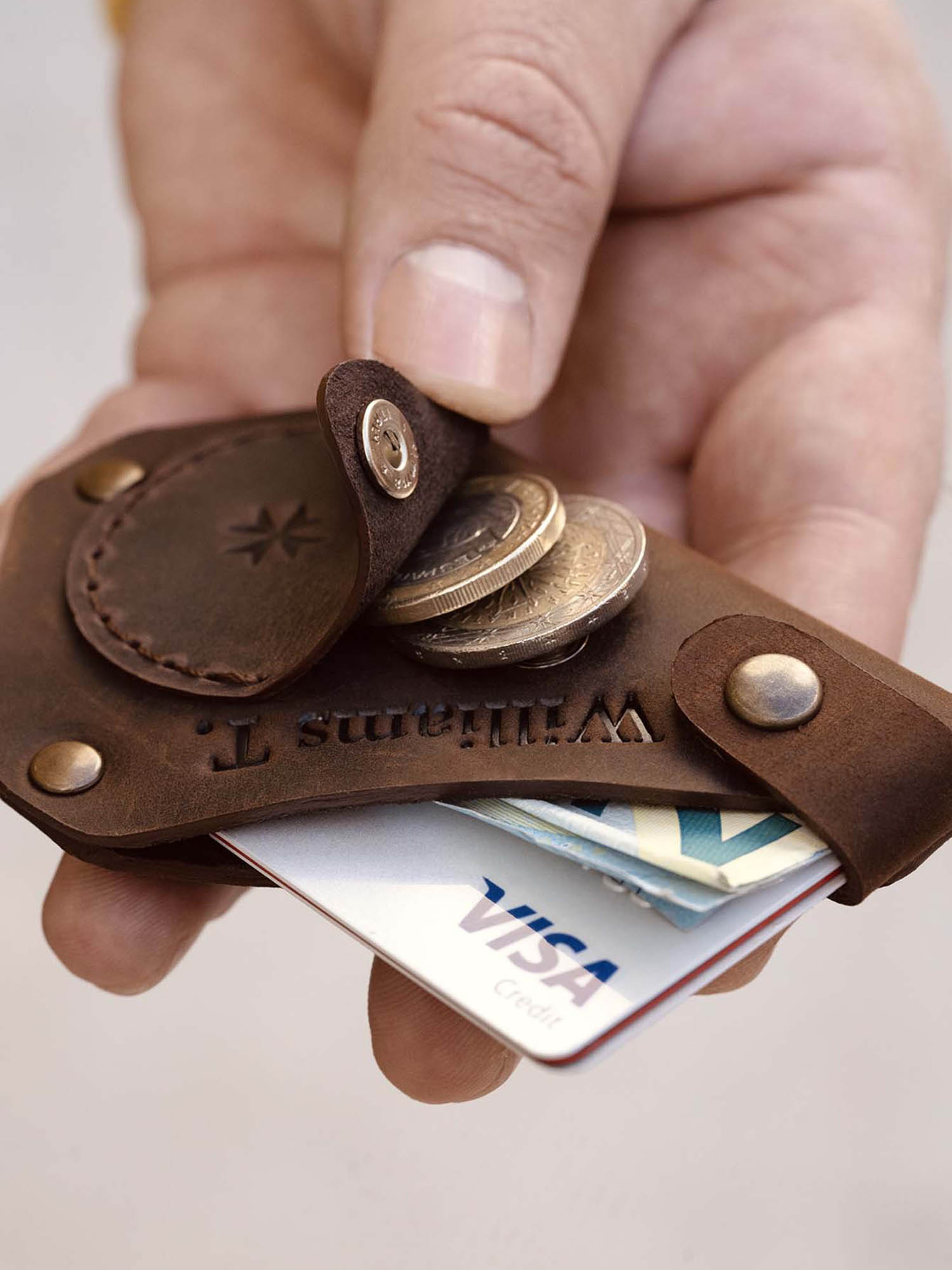 Portafoglio per carte, banconote e monete “Trigono”